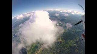 Flying Amongst the Clouds @ 11,000 FT (GoPro HERO3+ on Wing Strut of Cessna 172)