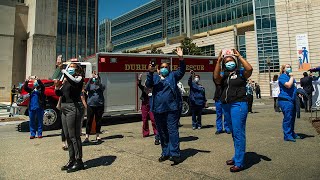 First responders parade through Duke University Hospital to thank healthcare workers