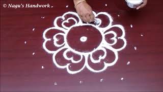 Kolam designs/Kolam with 7x4 dots/Rangoli designs/7 to 4 dots rangoli design/muggulu designs