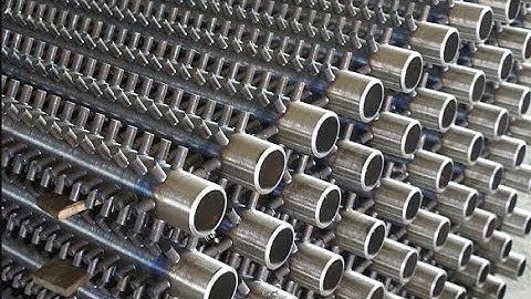 Short cycle stud welder welding unthreaded studs for industrial boiler heat exchanger