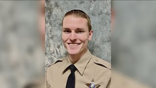 Ada County Sheriffs Office deputies honor Tobin Bolter by wearing black bands on badges