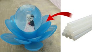 How to make a little flower to decorate the house with glue gun glue