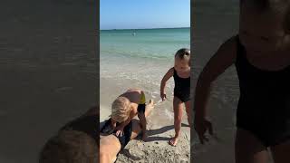 Baby gives mom a massage on the beach. Cute Beach Video! #beach #babydaniel #cutebabies #kids