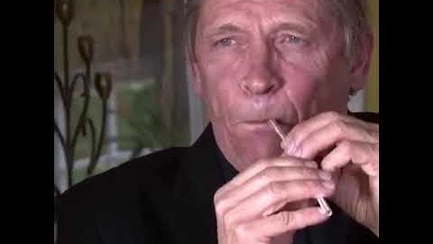 Bassoonist playing a straw