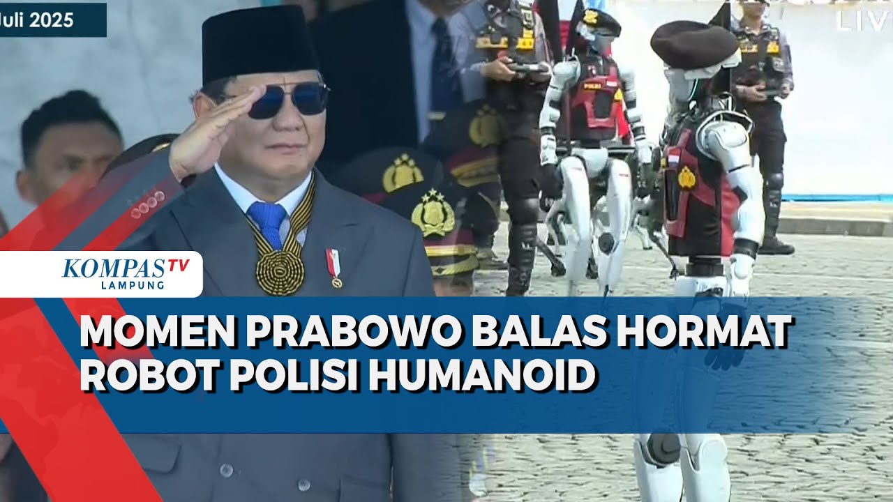 Prabowo Tersenyum Balas Hormat Robot Polisi Humanoid di Upacara HUT Bhayangkara
