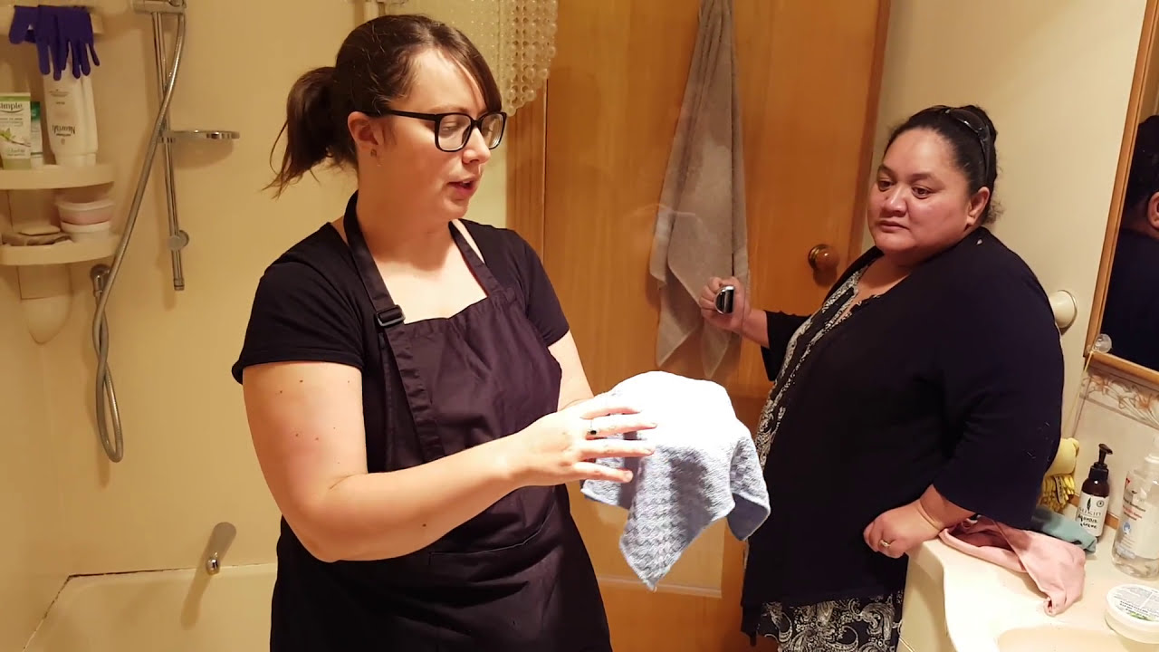 Norwex demo cleaning paste and scrub cloth on shower door YouTube
