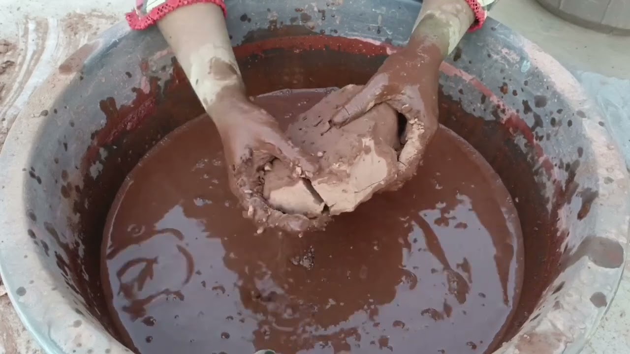 Asmr. Dairy milk dirt clay water crumbling in tub smashing video