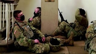 National Guard troops nap in Capitol