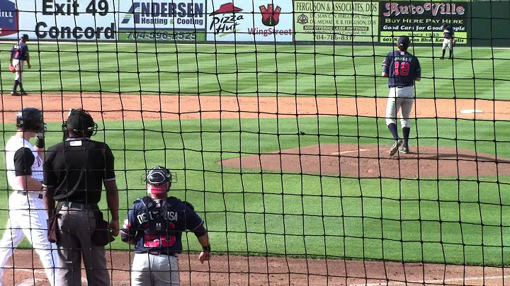 Brandon Barker pitches to Chris Curley Rome at Kan...