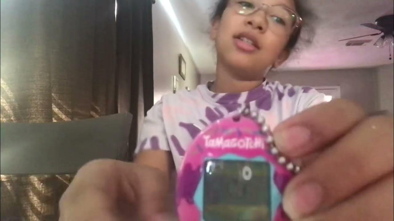How to use a tamagotchi - YouTube