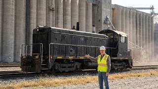 Huge grain terminal using an old EMD to load outbound.