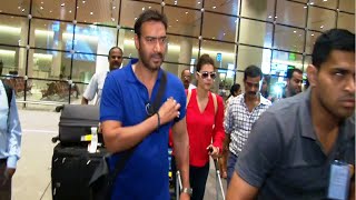 Ajay Devgan and Kajol with family at Mumbai Airport returning back from a vacation.