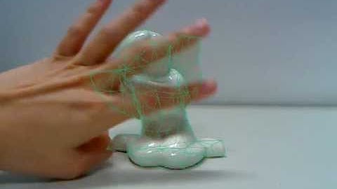 Model-based tracking of rigid curved surfaces - Occlusion