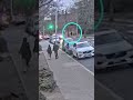 Brown University suspect walks past police officers after shooting