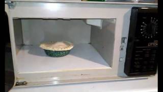 Cooking a chicken pot pie in a 1980s microwave
