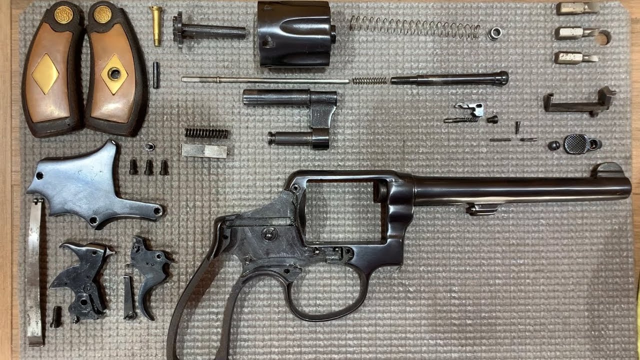 Smith & Wesson (SW) .38, desmontagem completa, limpeza e montagem com lubrificação.