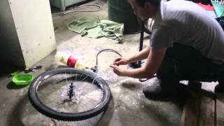 Seating tubeless wheels with a coke bottle