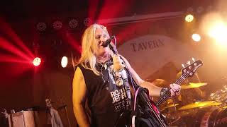 Aunt Betty performing **Metallica’s “Enter Sandman”** live at **Crescent City Tavern