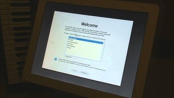 First boot of Mac OS X 10.4 Tiger on a iMac G4!
