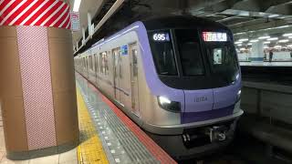 Tokyo Metro 18000 series 18104F departing Kita-Senju Station