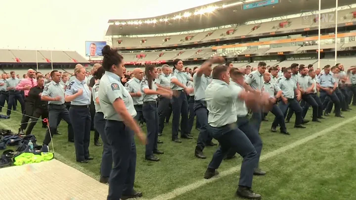 Police officers perform a haka at the funeral of C...
