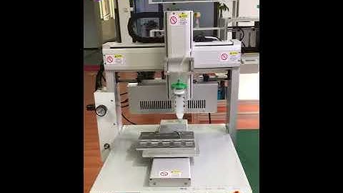 Dispensing curing machine