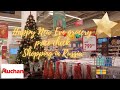 Happy New Year grocery price check. Shopping in Russia, Moscow. Big grocery store Auchan.