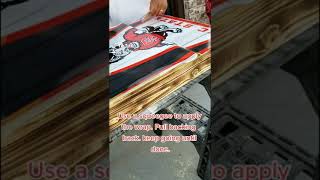 Step by step on how to apply a decal on a cornhole