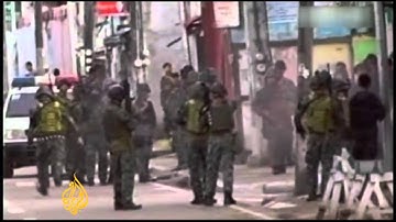Fighting rages amid Philippine hostage crisis