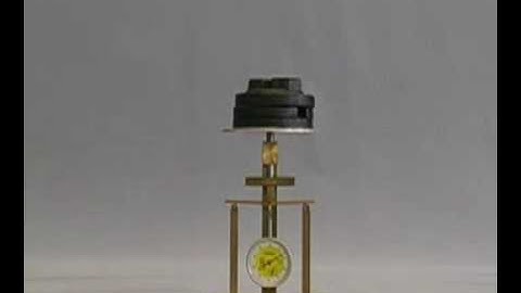 A three-point bend test: deflection and failure load of a greenheart wood sample