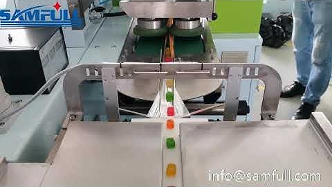 Semiautomatic candy flow wrapper