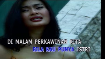 Iis Dahlia - Tamu Tak Diundang (Official Video Karaoke HD)
