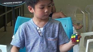 Chan Hong Lik 5 yrs old solves rubik&#39;s cube one handed 42.25 sec