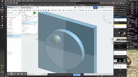 Smile Keyring in OnShape - Smile 2: Revolving and mirroring the eyes.