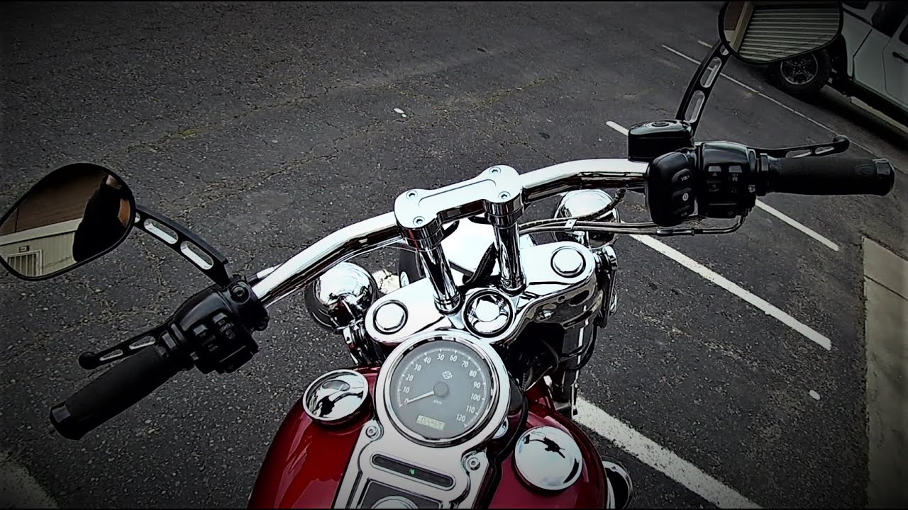 2012 Dyna Switchback new handlebars before and after. Thrashin risers