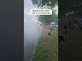 Firefighters Spray Kids With Water In Hot Weather At Local Festival Firefighters Spray Kids With Water In Hot Weather At Local Festival