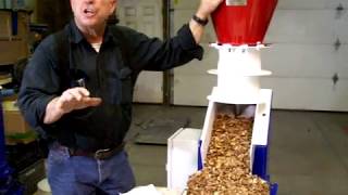 The Patriot 600 Industrial Strength Nut Cracker cracking pecans.