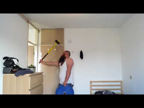 20 kilogram plate pinch grip and a sledgehammer lever with the other hand 2