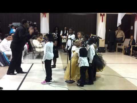 Tasir singing with Evelyn graves Christian academy