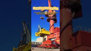 The loaders are loading cargo into the general cargo ship at a Chinese port.  #bulkcarrier