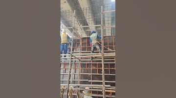 Install reintaining wall formwork under bridge construction