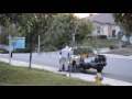 Beekeeper works to remove bee swarm in Menifee
