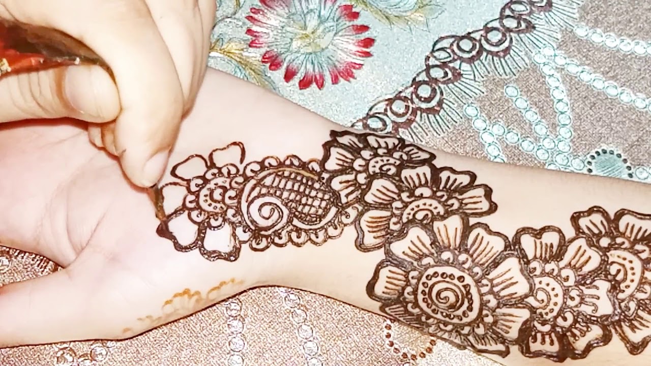 Attractive And Amazing Henna Design Of Back Hand Side Floral