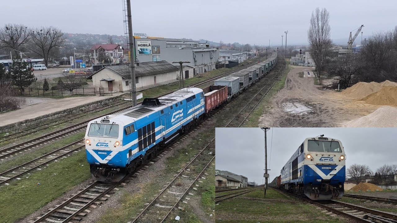 Тепловоз ТЭ33АС-3009 с грузовым поездом 