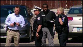 Bystander shot in the head by suspect in Woodlawn bank robbery, police chase