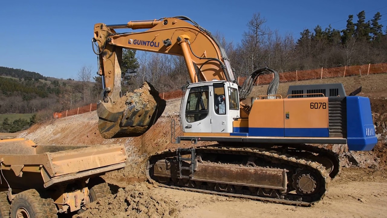 💪 High productivity - Liebherr 974B loading articulated dump trucks - Part 1