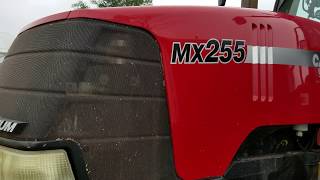 How to operate the case MX 255 Magnum tractor getting ready to push corn silage