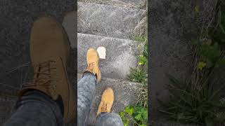 Timberland Boots Taking The Stairs And Trample Some Bread