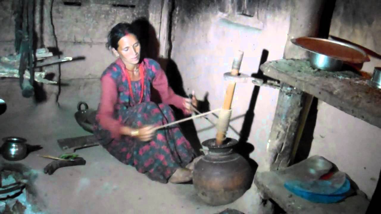 LFUG member Ms Lalmati Budha is extracting butter from cow curd. YouTube