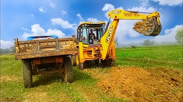 New Jcb 3dx Backhoe Loader Machine Loading Red Mud In Sonalika 42 DI Tractor